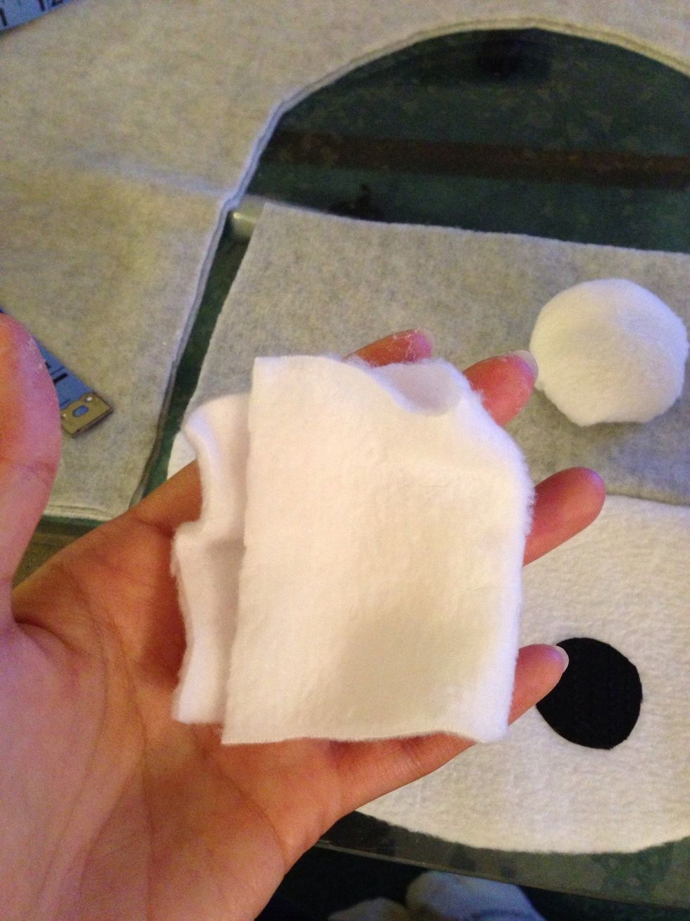 Now the tricky part. The eyes. I first started cutting circles but my bf said he wanted the goofy eye look, grab ur scraps. Take the white & leave the bottom flat. Use the edges & squish the rest up
