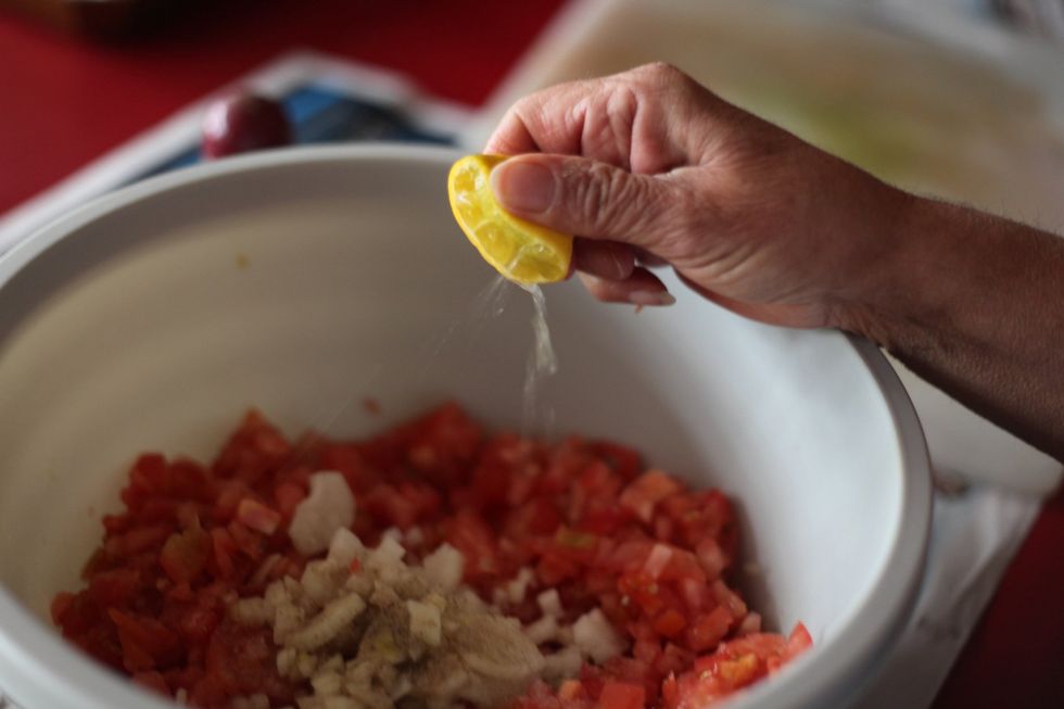 Now this is entirely up to you how many lemons you add to the mix. We don't like it so sour so we use 2 tiny lemons. Average would be to use 2 large lemons. Squeeze into you mixing bowl.
