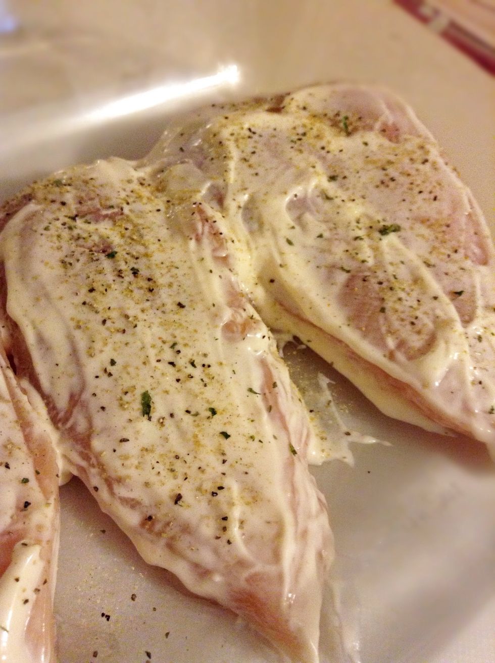 NOW this is optional, I add some of my own personal seasoning right on the chicken. I use just a season all spice from the brand Morton.