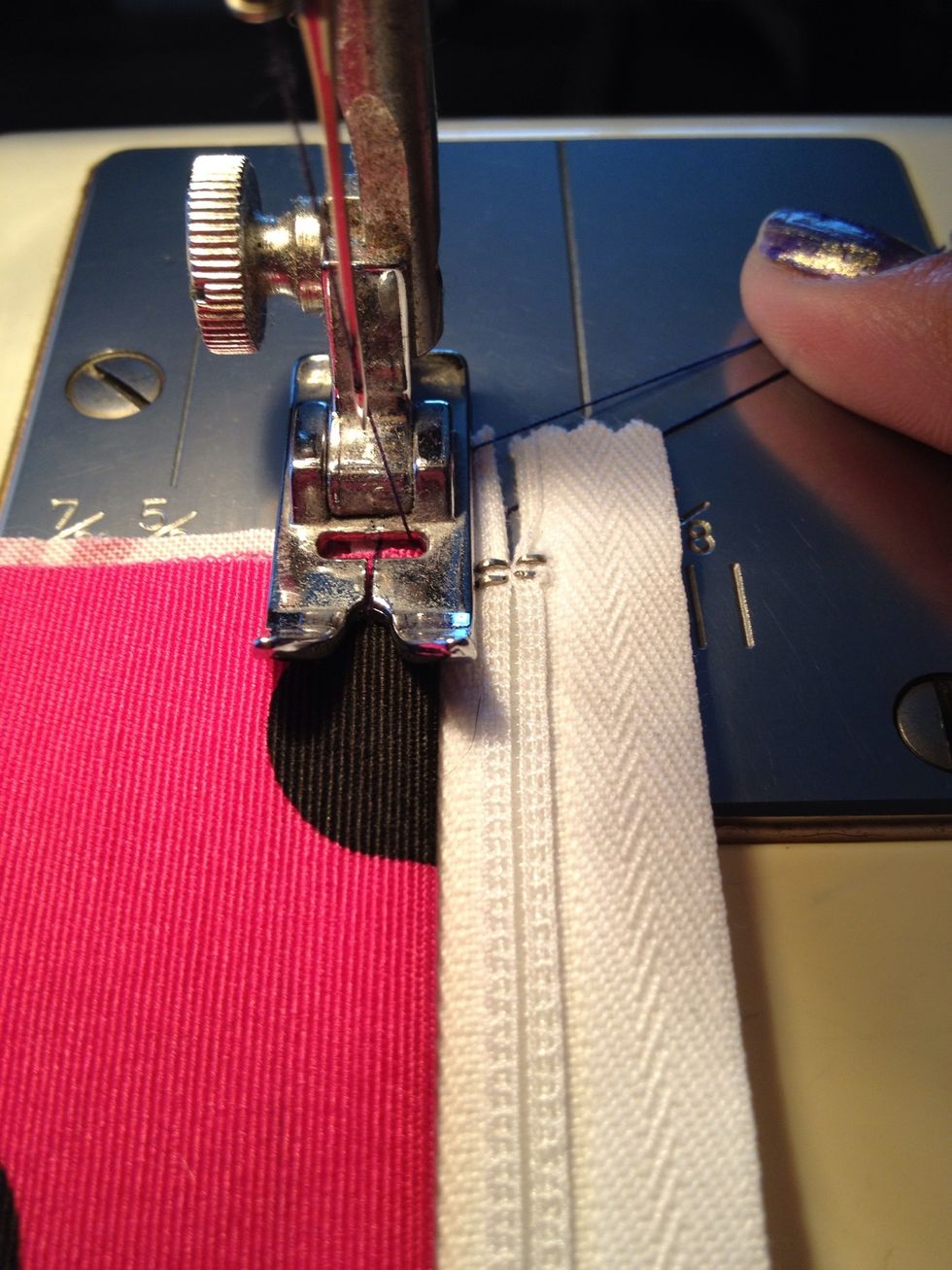 Now this is optional. sewing a straight seam along the zipper. I think that this is called a top stitch seam. ( don't quote me. :D) this just make the seam more sturdy also give it a finished look.