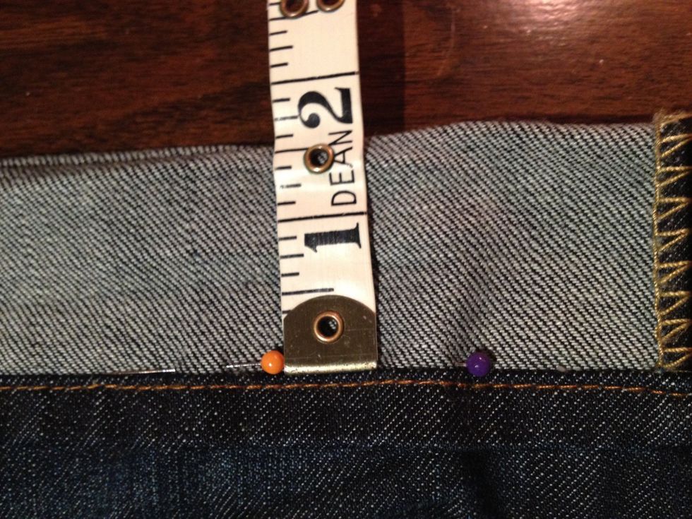Now, this may seem weird but take the length you want off & divide by half & re-pin your jeans so the fold is half the length they were before. In this case, 3 inches has now turned into 1.5 inches.