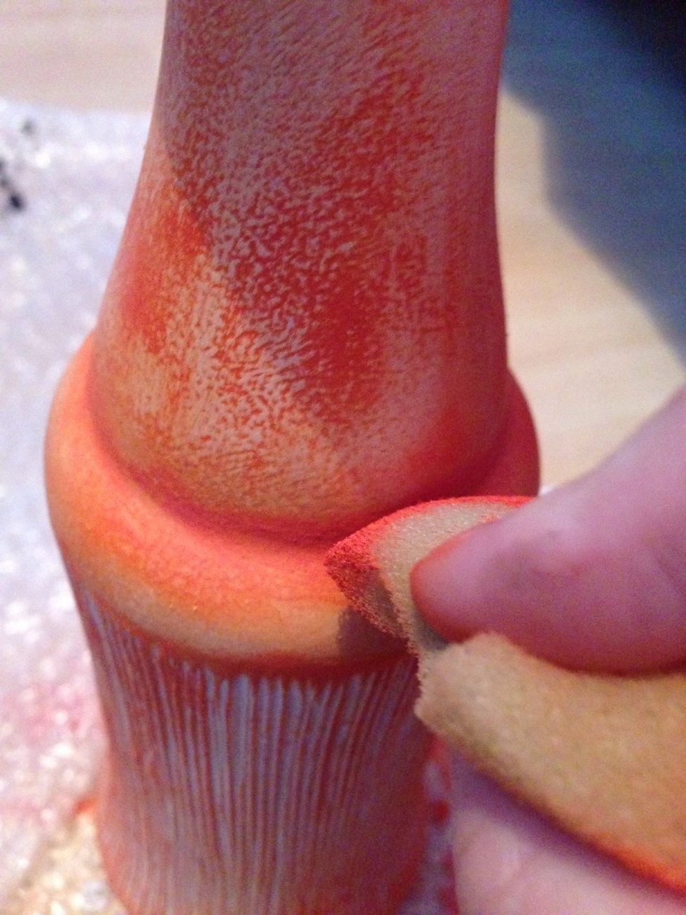 Now this section is complete you wanna make that detail stand out. Using the edge of the triangle sponge add some paint not to much not as less as usual. Now highlight the rims of detail **effect