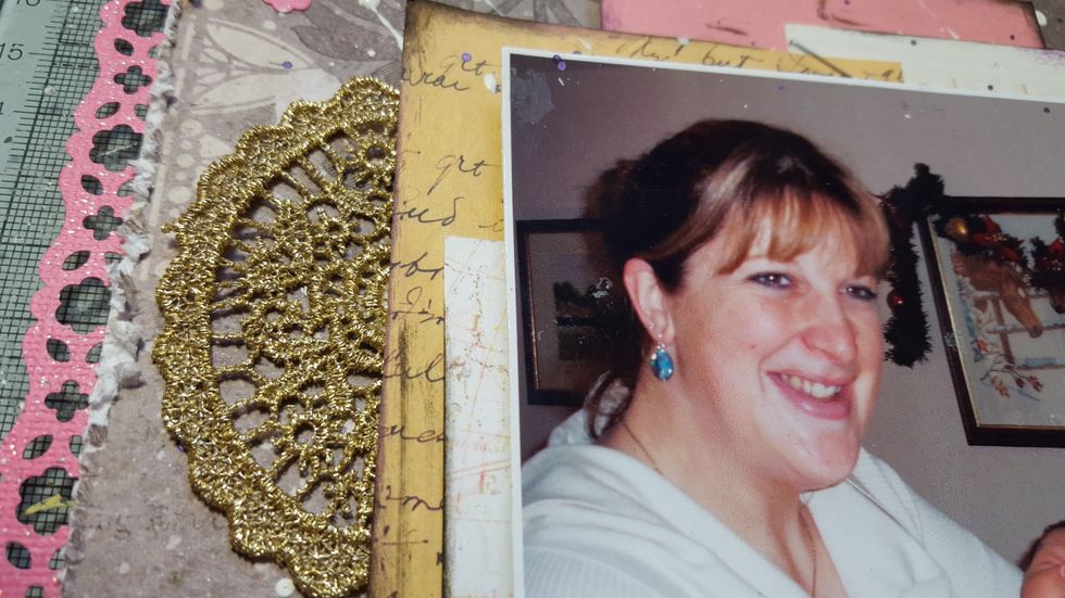Now time for assembling. With your photo placed but NOT stuck in position on your background paper slot the gold lace under the journal cards on both sides and stick down.