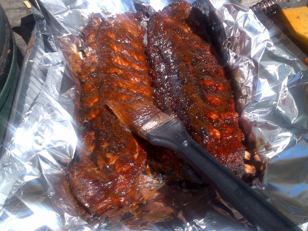 Now time for Texas Crutch. Double foil and add sauce. Wrap complete and put back in heat for another half hour