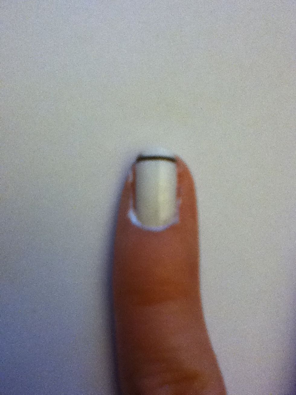 Now time for the pinky nail. Start by drawing a thin black line on the upper part of the nail.
