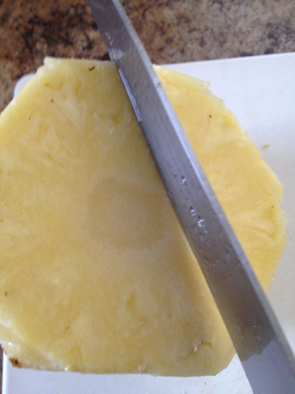 Now time to cut again. See that circle in the center? You don't want to eat that it's tough and chewy and blech! So we are going to cut around it.