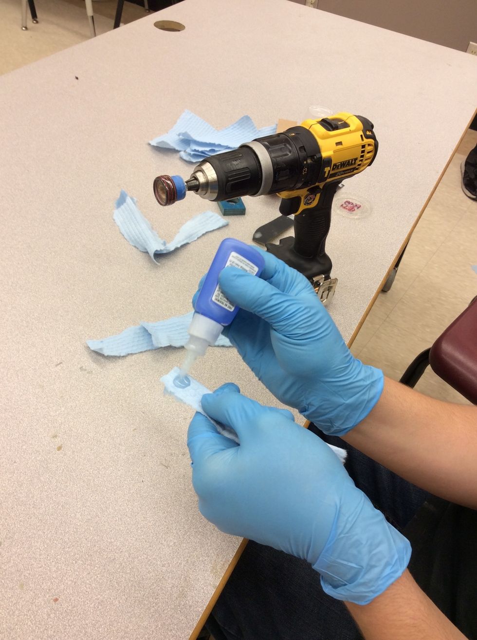 Now time to finish your ring! Take a industrial cloth and put a thick layer of super glue on the cloth. You are going to want 8 to 10 coats of glue