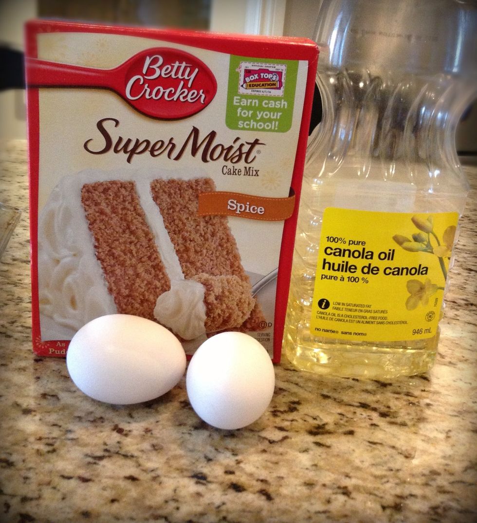 NOW time to make the cake mix. Simply follow the institutions on the back. You'll need to use the two eggs 1/2 cup of canola oil and the 1 cup of water.