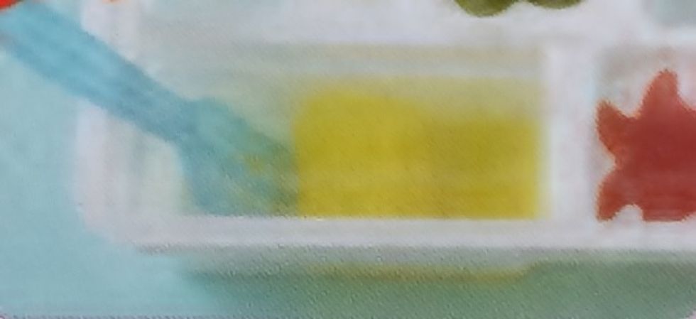 Now time to remove your other ingredients-Loosen edges around Tamagoyaki and Carefully Peel out of Mold-Start at one end and roll the Tamagoyaki(Egg) into a Roll like on Packaging-Set on your placemat