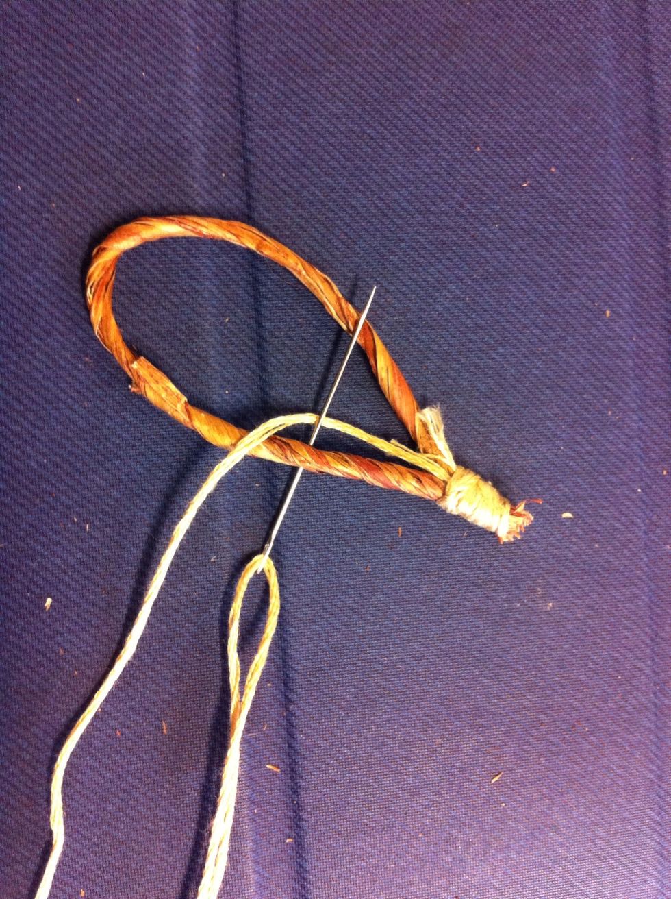 Now to create the anchor points for the weaving. Create loops around the floral wire as shown.