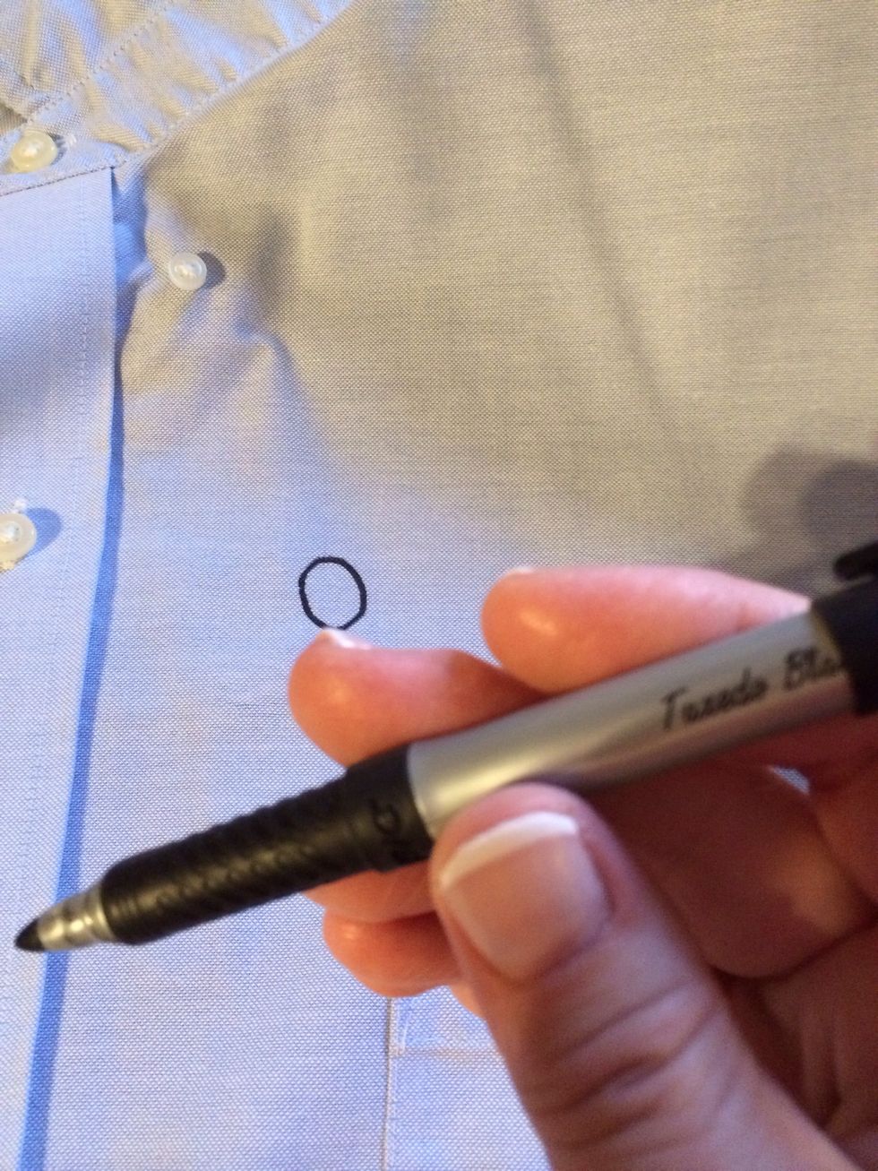 Now to design. Use art supplies, food products, or anything that creates the color and texture you like. Be creative with what you already have on hand. I'm making a bullet hole with a marker.