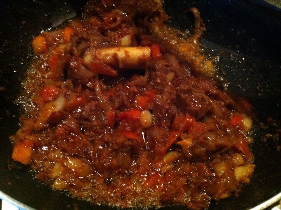 now to onion tomato mixture add your previously cooked mutton.. note>>previous step onion and tomatoes will make gravy and 2nd step onion+tomatoes will make content