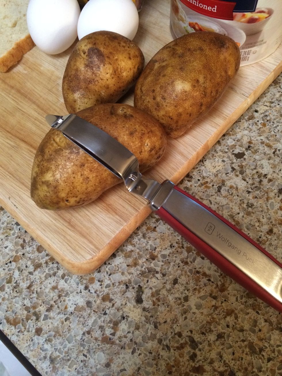 Now to peel the potatoes