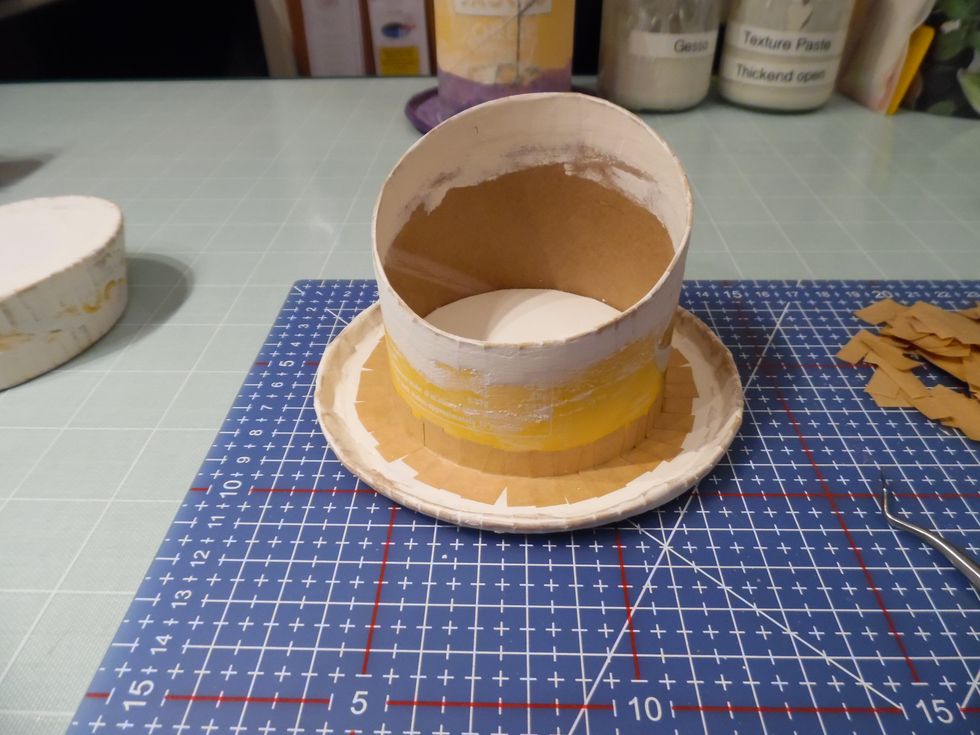 Now to start the assembly. Stick the brim and hat base to each other with Gumstrip.