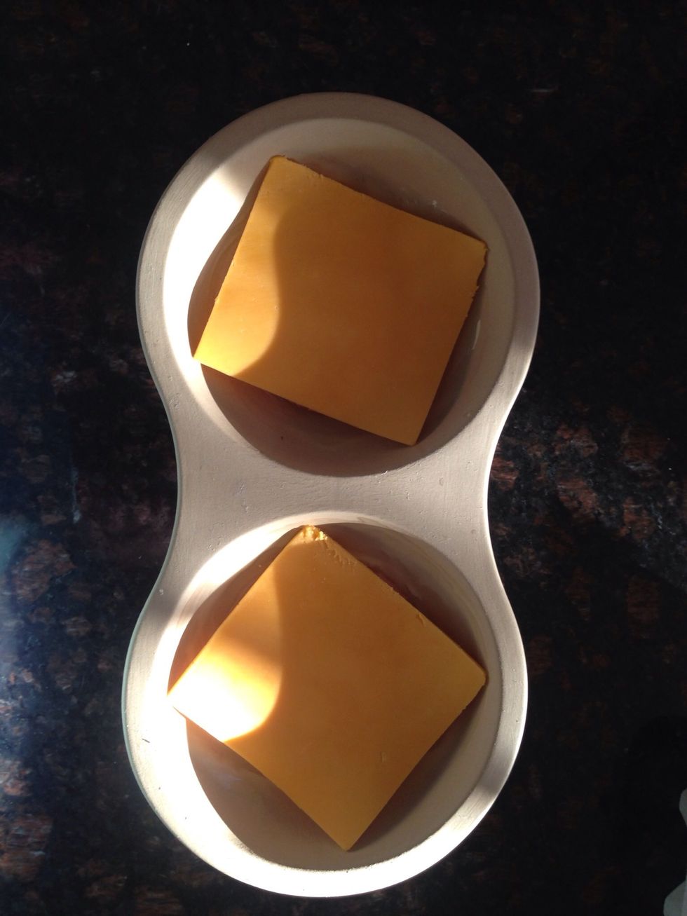 Now to top each off wi 1 slice of cheese.