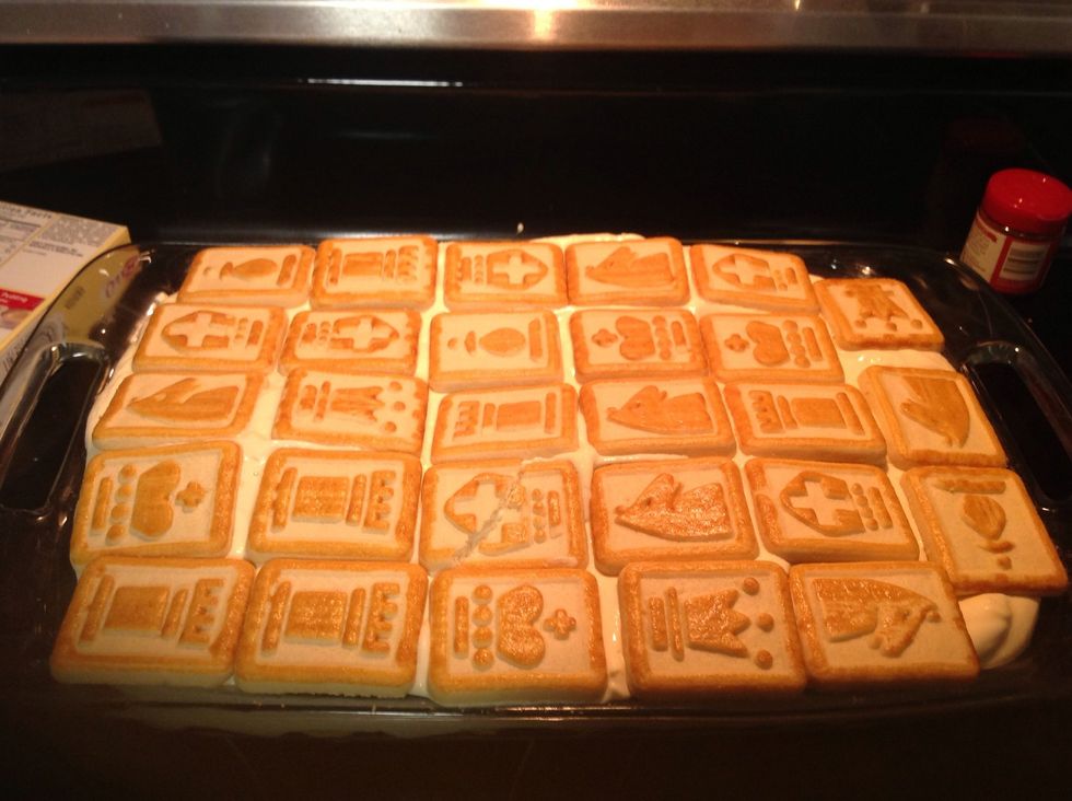Now top with cookies and put into the fridge to chill for thirty mins to an hr