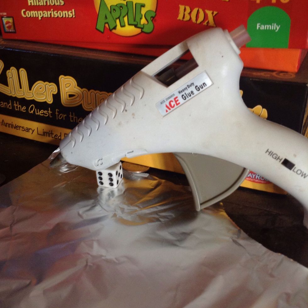 Now turn on the hot glue gun to warm up