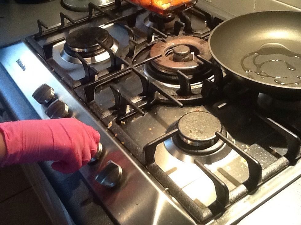 Now turn on the stove and let the oil sit there until it bubbles