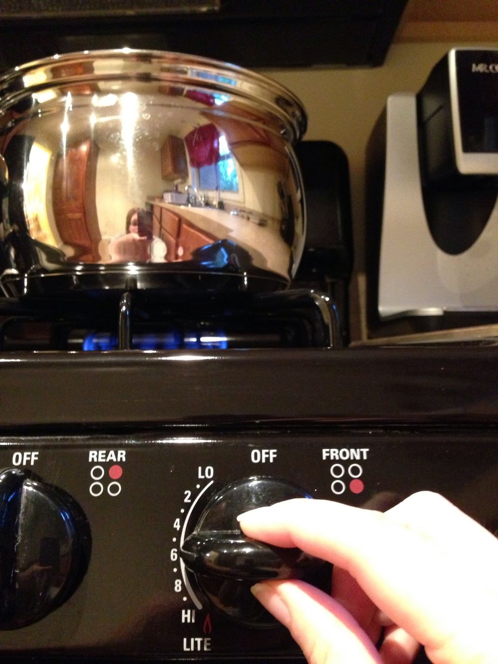 Now, turn the burner to medium heat. You will need to watch the water carefully.