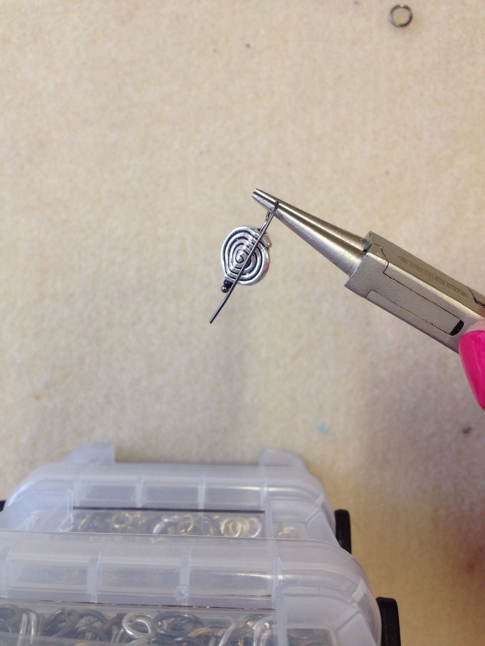 Now turn the pliers again at a 90 degree angle, this allows room for the wire wrapping stage