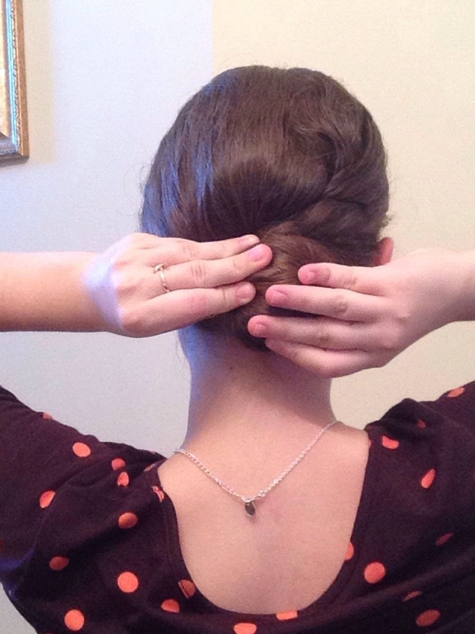 Now, twist all of your hair to form the shape of a bun.