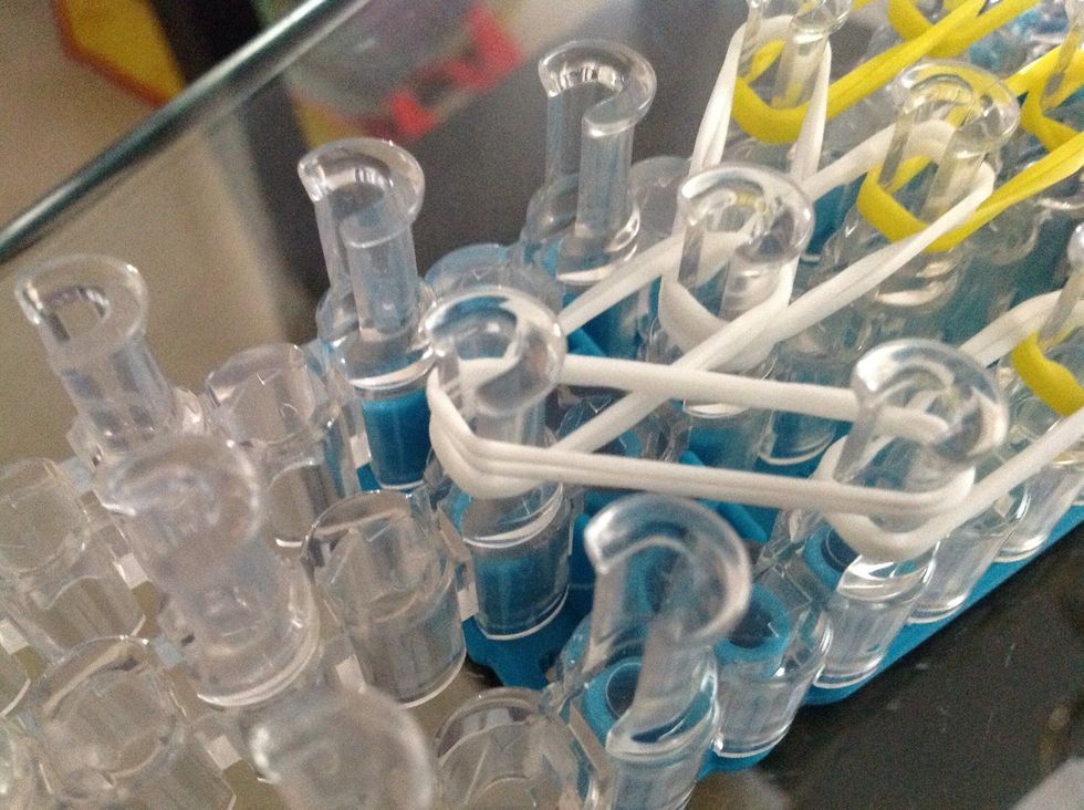 Now two white bands down the middle and two connecting two the middle