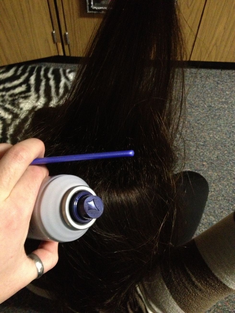 Now use hairspray then the comb on the back of the second layer just like the front.