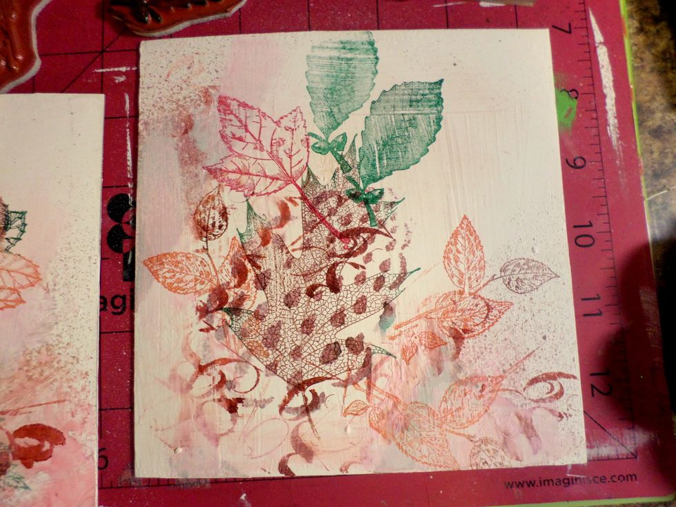 Now use the leaf stamps on the block. Use different colors and stamp randomly again.