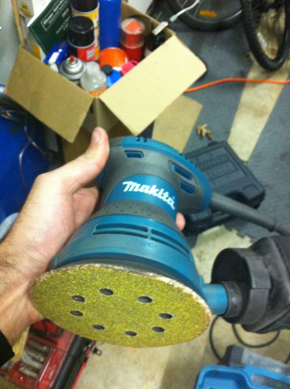 Now use the orbital sander to get all the rust nice and rough. There will still be pits left, we'll get to that.