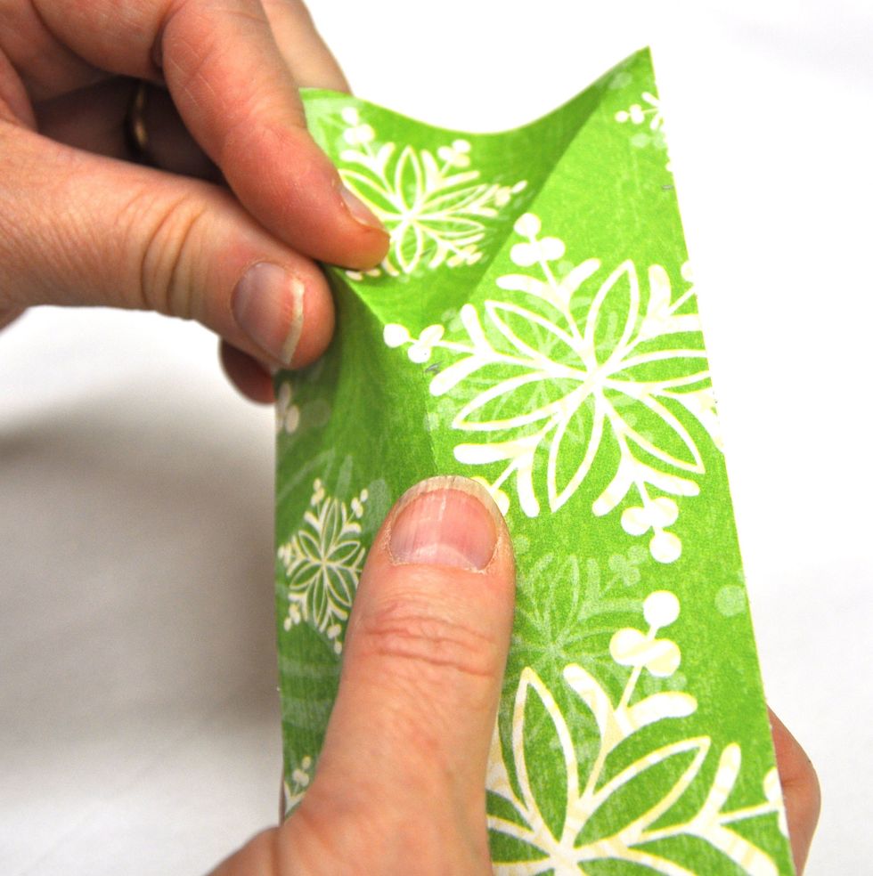 Now use the score lines to fold each of your star pieces.