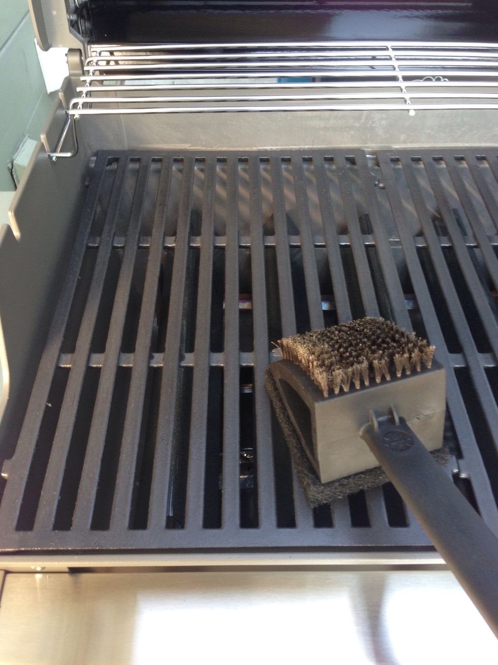 Now use the scrubber on the entire grill.