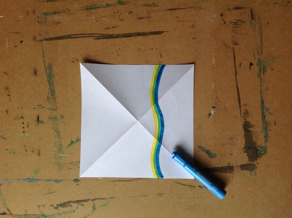 Now use your drawing supplies to create a bold design on one side of your paper. Remember that these are going to be outside. You want the design to be visible.