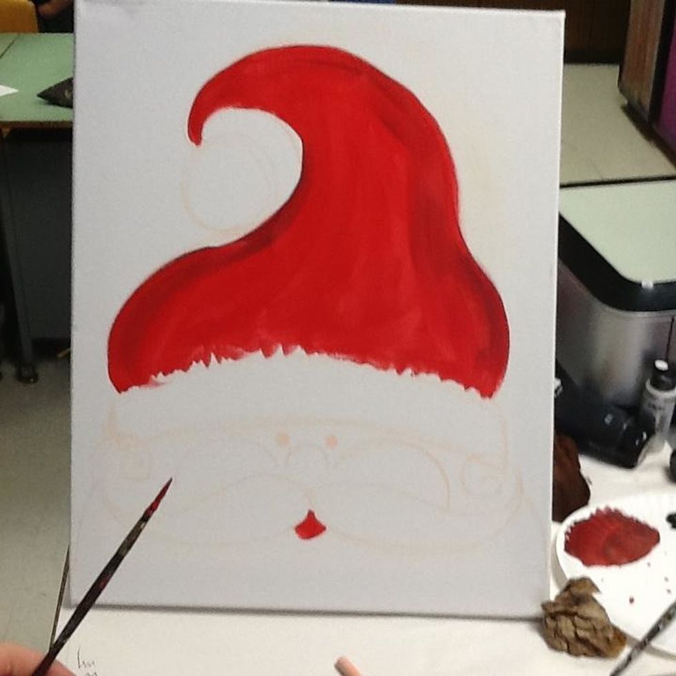 Now use your smaller round tip brush to paint his little mouth.