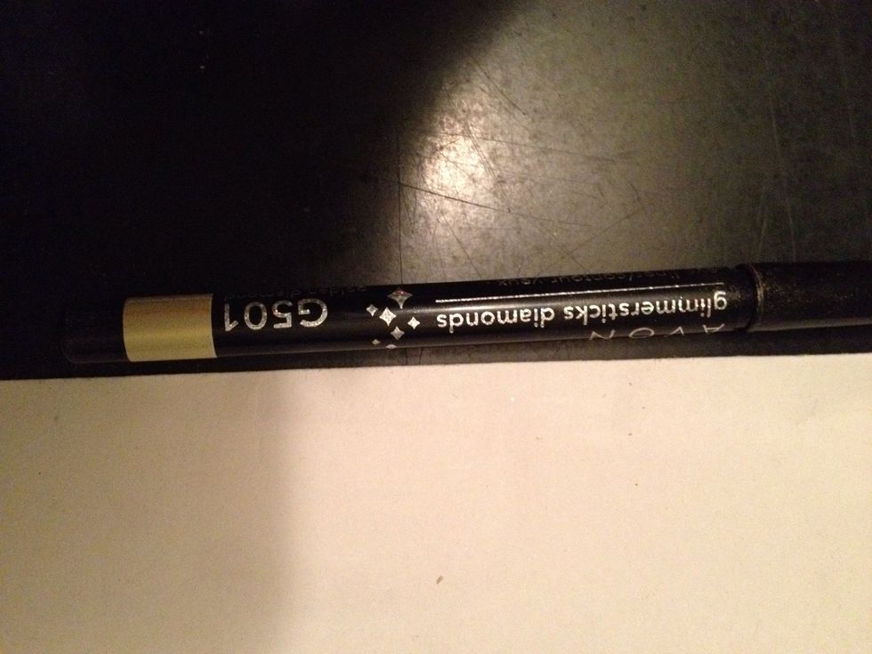 Now using a white eye liner go over the bottom of your eye lids like as if your putting eye liner again. Make sure only from the inner corner to middle of eyes. This makes your eyes appear bigger