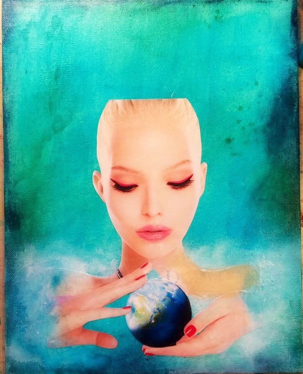 Now, using gesso and your fingers I softened the edges of her shoulders and hands. I used layers of gesso and Baby Blue Eyes. Just keep layering until you get a nice soft edge.