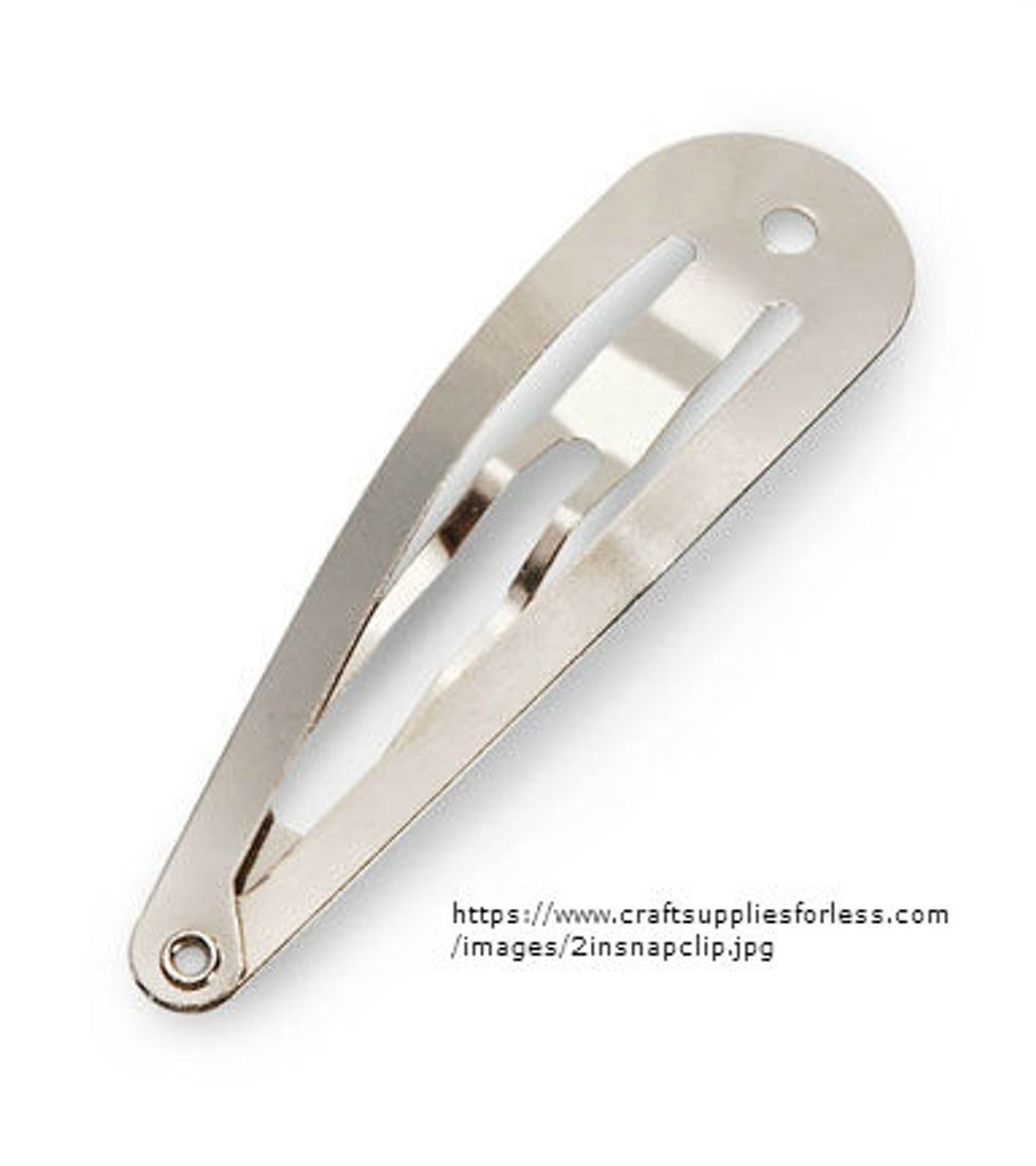 Now, using how ever many pins you need, clip up the extra hair.