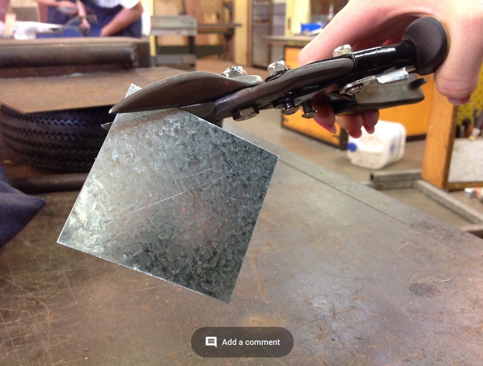 Now using the tin snips cut out the perfect circle.