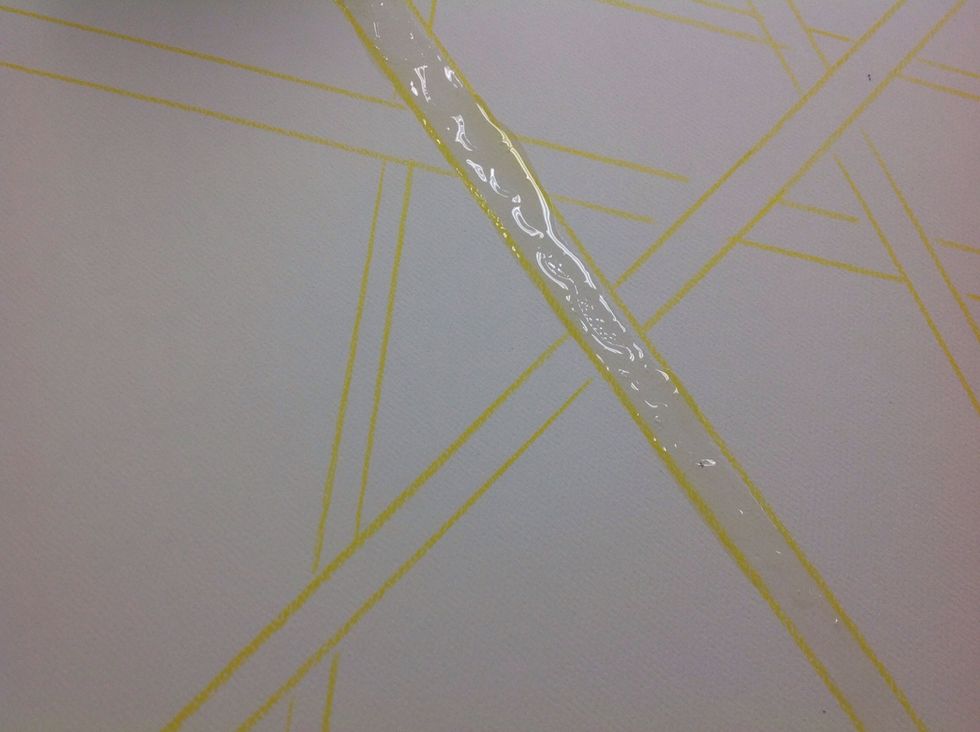 Now using your foam brush and rubber cement, paint the rubber cement onto the paper inside the lines you want protected from paint.