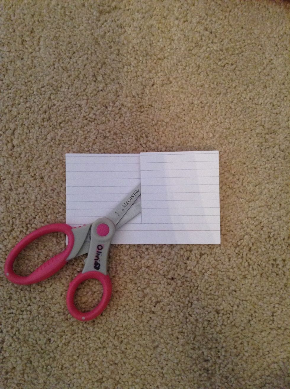 Now, very carefully cut the index card using your previously drawn line as a guide.