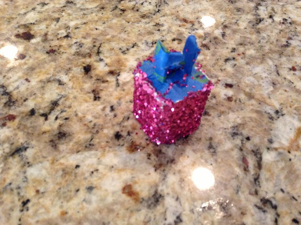 Now wait for the mod-podge to dry underneath the glitter
