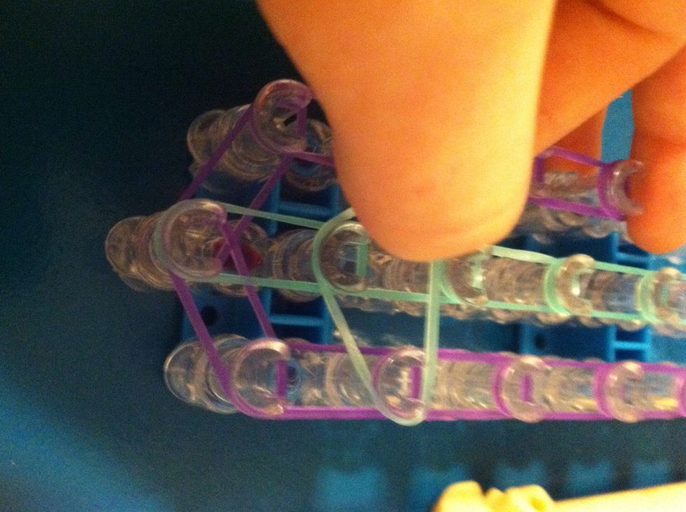 Now we are going to add triangles these gold the creation together skip the 3 pegs with the arrow on it and add a triangle