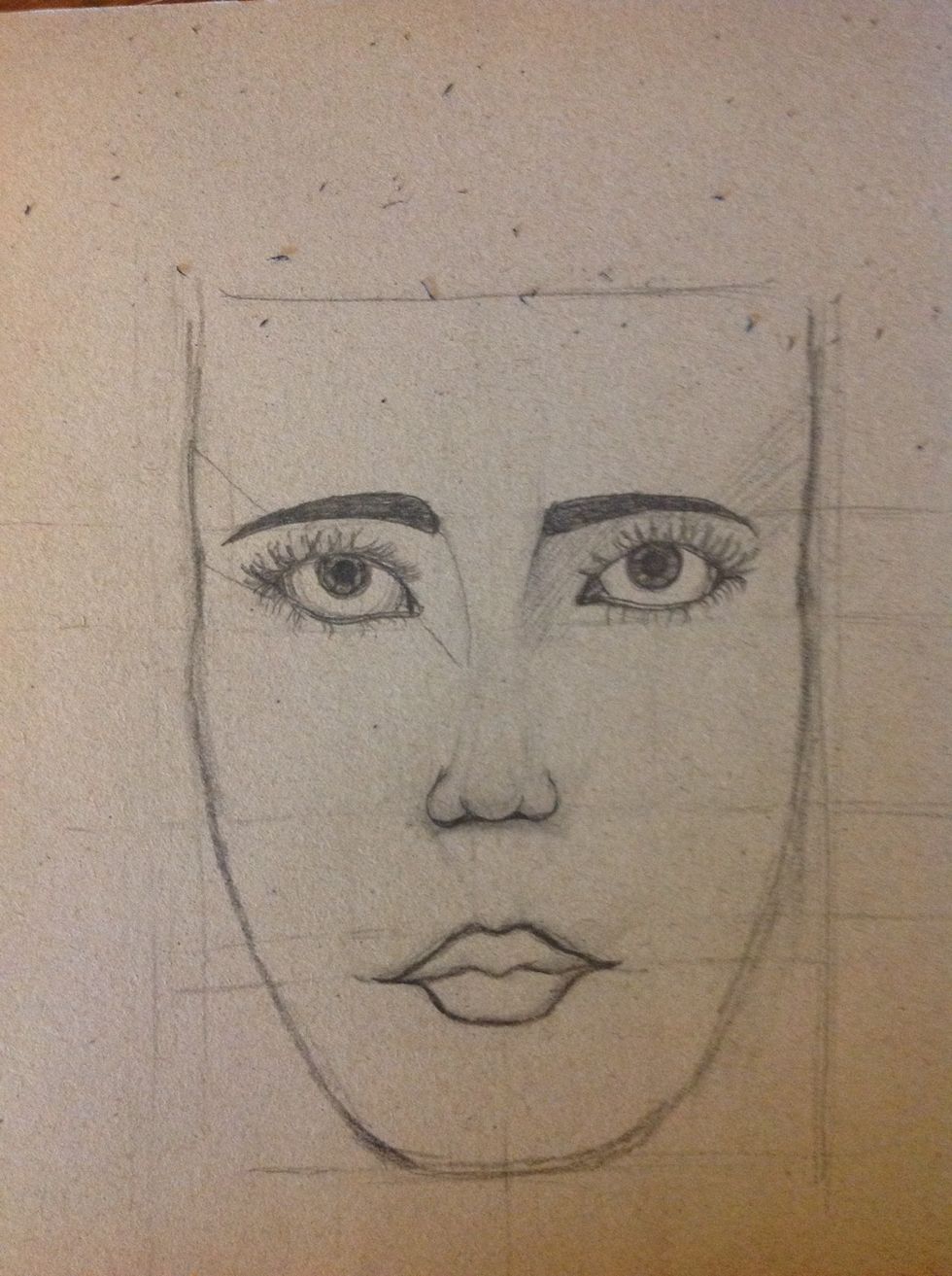 Now we are going to make the shadows in the face, remake the eyebrows and make with a pencil tiny lines (don't press) as you can see in the picture.