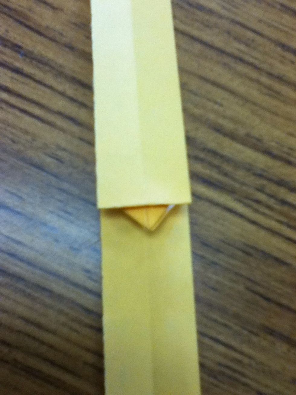 Now we are gonna fold up starting about 1/3 the way up the triangle inside