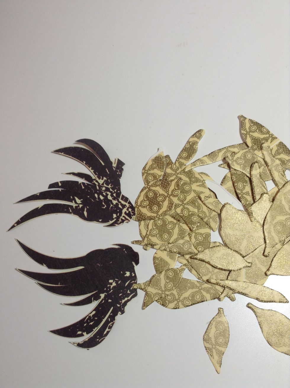 Now, we cut the wings of the "Time Flies" Graphic 45 Steampunk Debutante paper and adhere the "washi" wings to them.