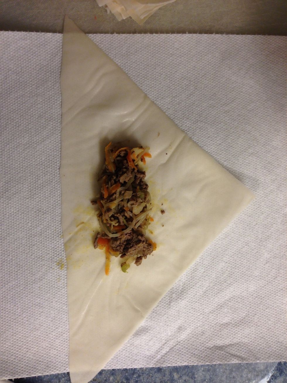 Now we fold a lot of spring rolls