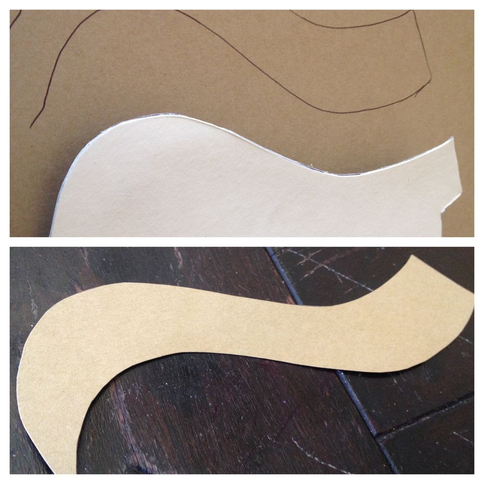 now we'll create a fun detail for the inside. trace and cut out the top inch of the harp on a light brown paper. this was difficult to make precise, so play around with what works best for you.