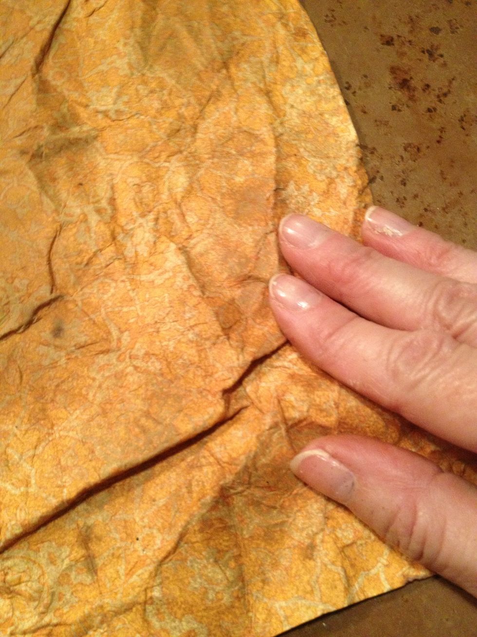 now we'll "shrink" this paper so we can layer our pages together. pinch paper and gather and fold as you pinch.