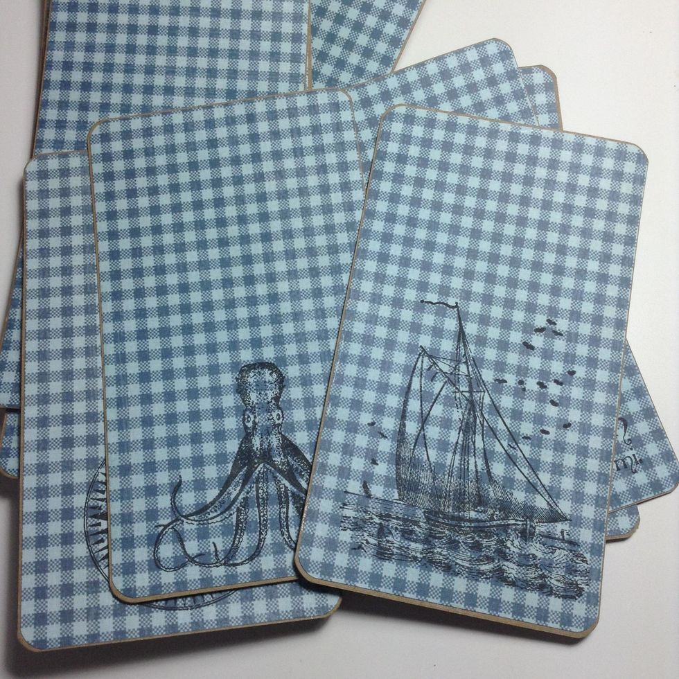 Now we'll stamp. (I have used Cling Stamp G45 By The Sea) Ink up the stamps with black ink.