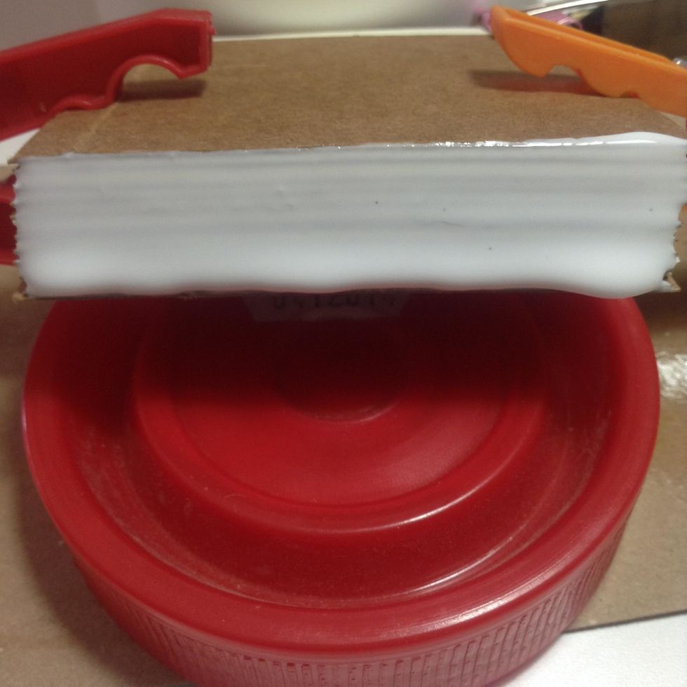 Now, we must glue all the pages with the kraft cardstock and glue at the spine...I have used Tacky glue