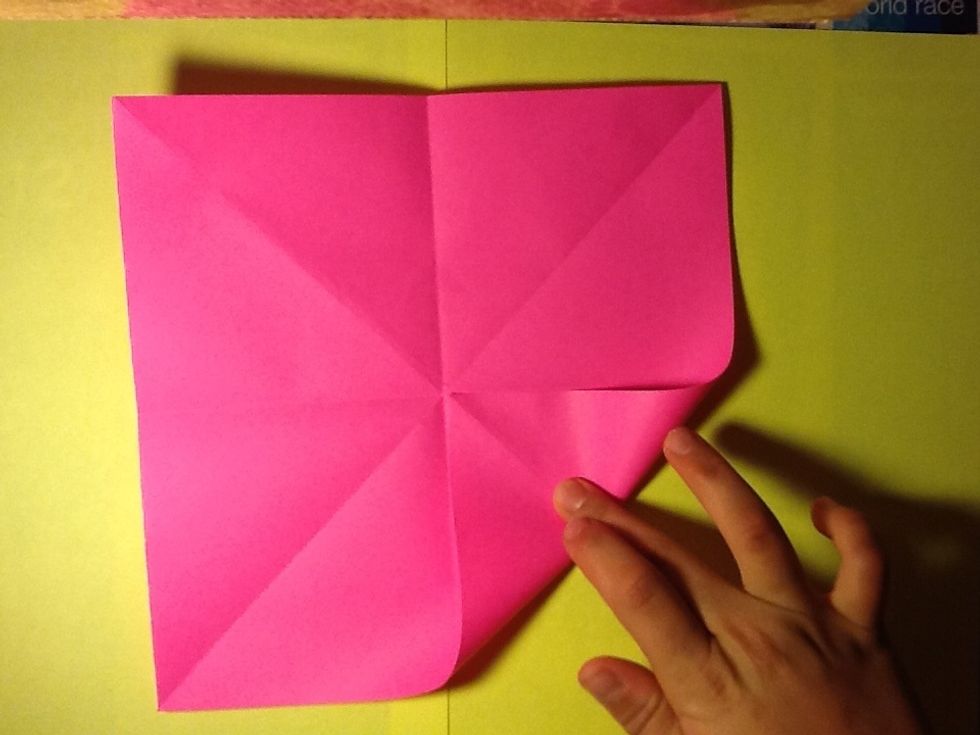 Now we put one point of the square to the center